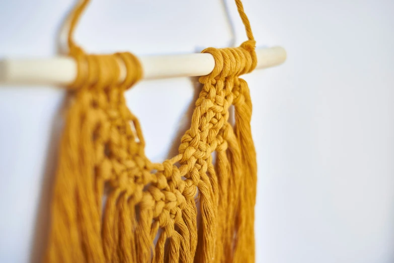 an object that has been crocheted and hung from the hooks