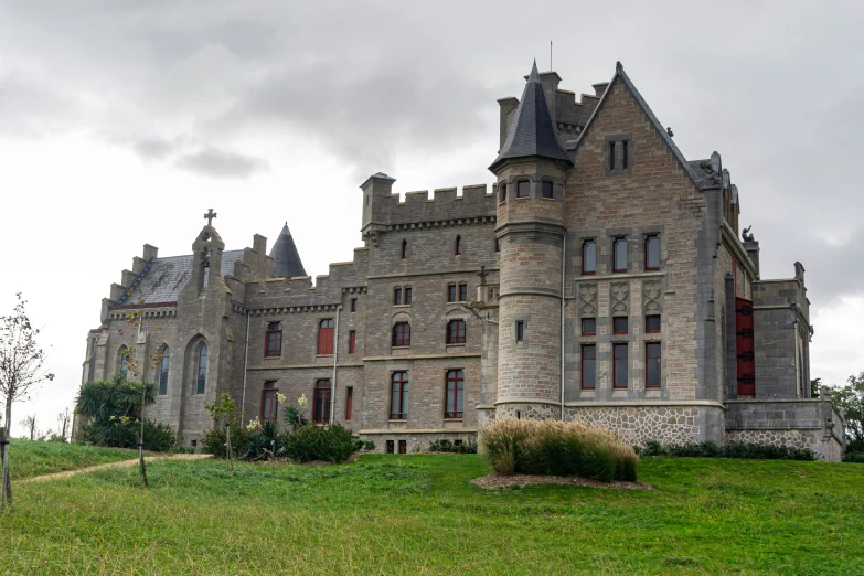 a large stone castle with many windows in it