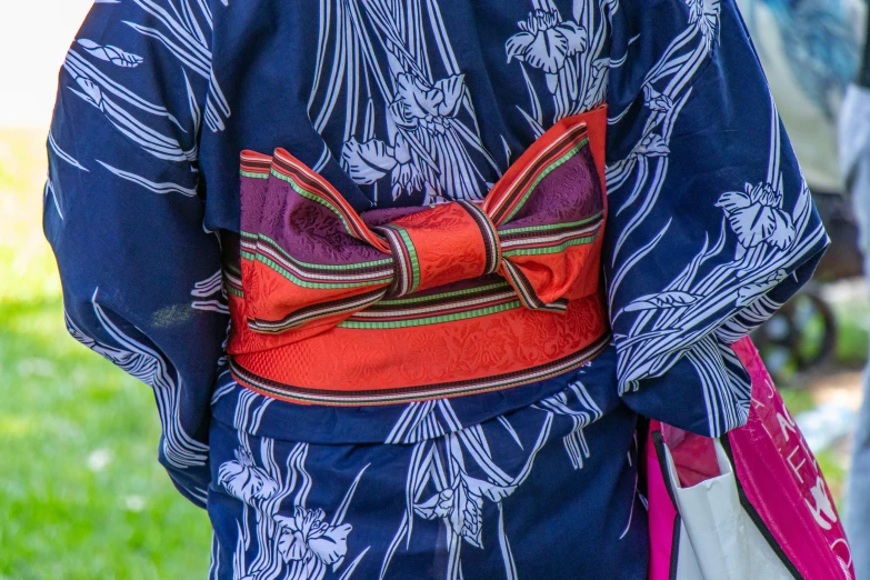 a close up of a person with a blue dress