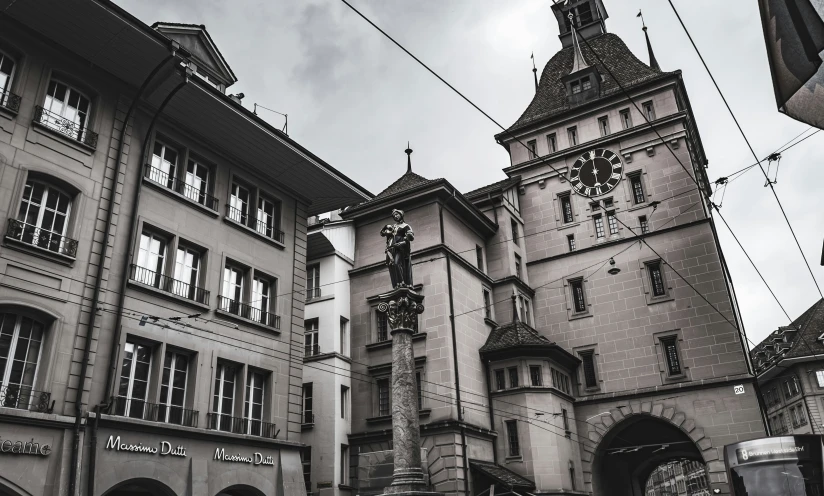 old buildings are surrounded by the wires