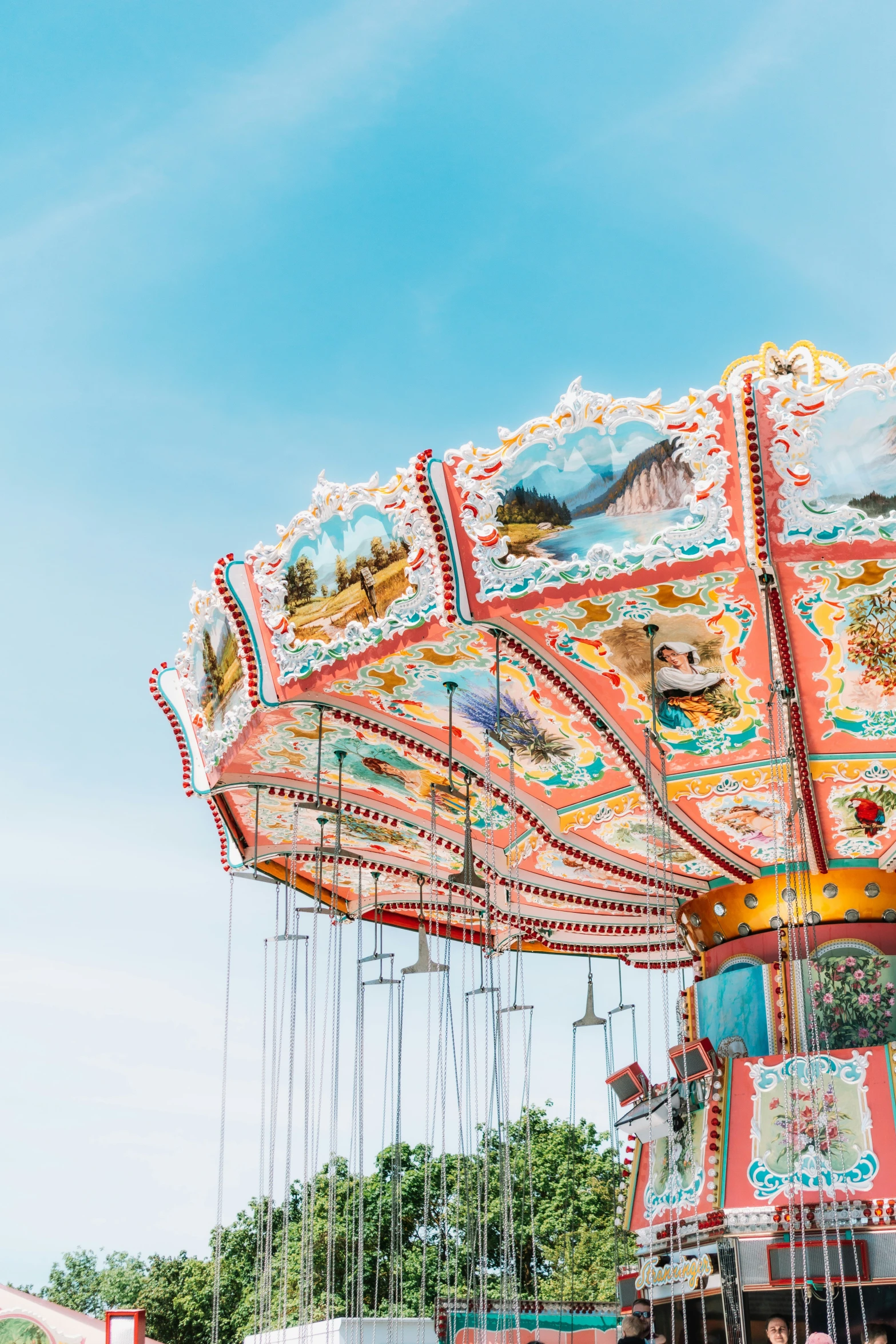 a very pretty colorfully decorated carnival ride