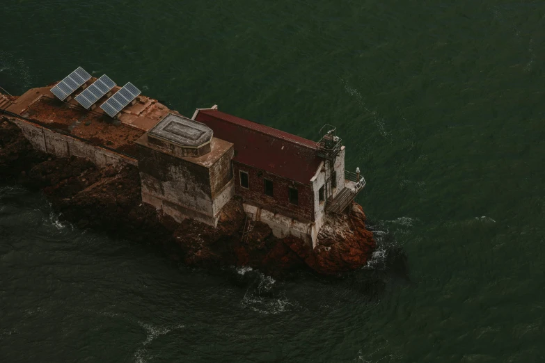 an old tower by the shore on a island