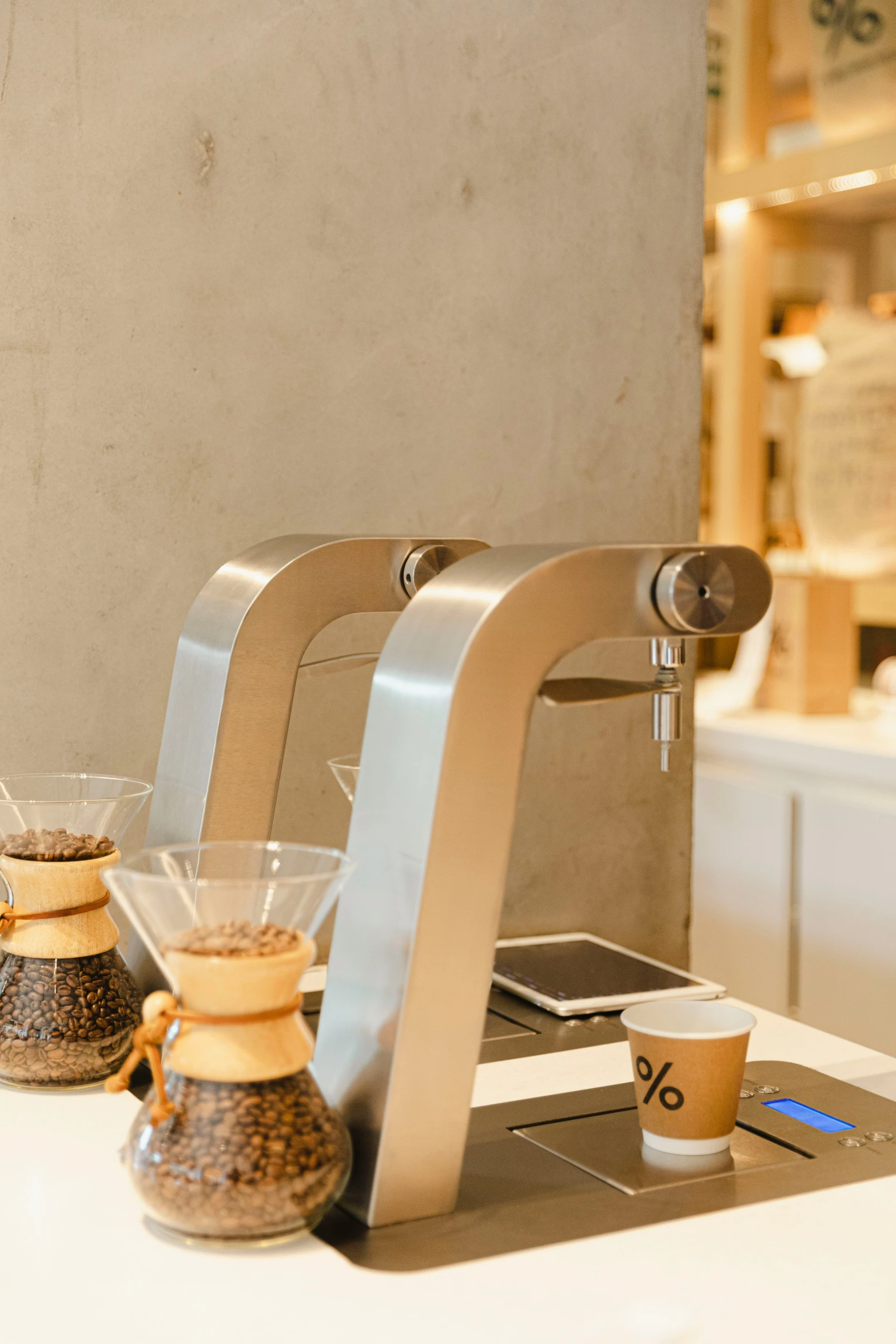 a coffee maker is on top of a kitchen counter