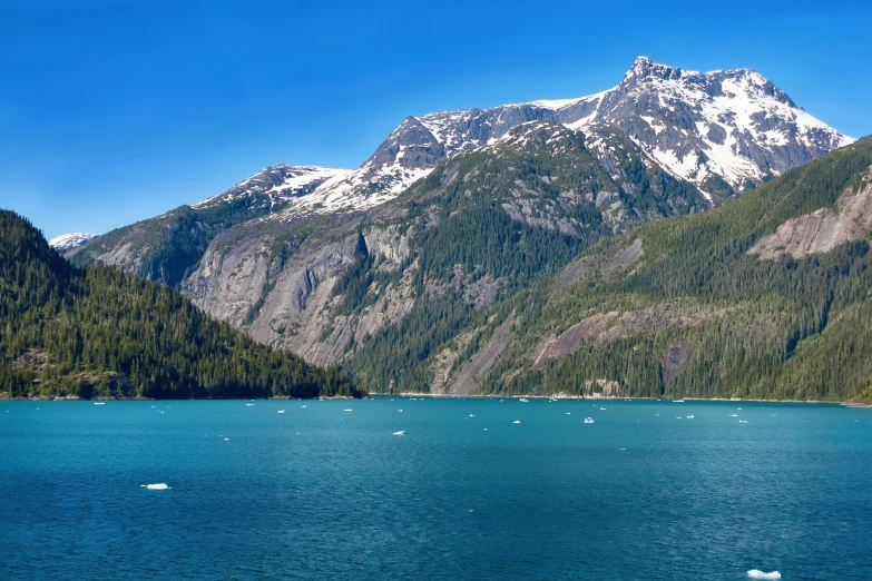 a mountain range is seen on a sunny day