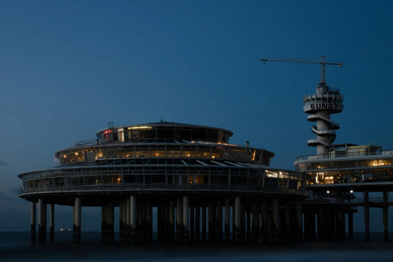 this is a very unique looking structure on top of the water