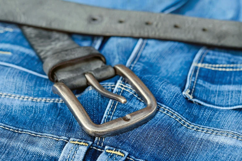 a belt with a loop on a pair of blue jeans