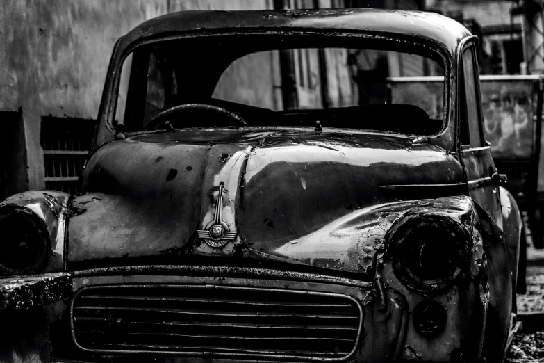 an old black and white po of a car