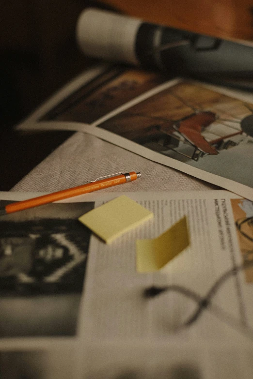 paper with sticky notes on a desk in an office