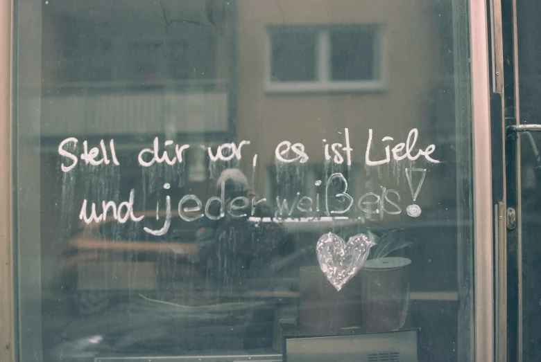 window with an old message written inside