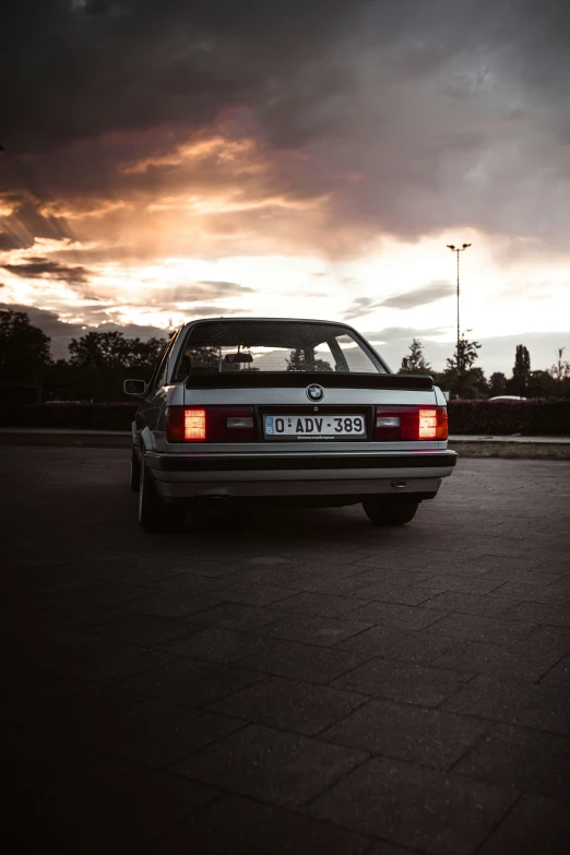 a po of a parked bmw car on the pavement