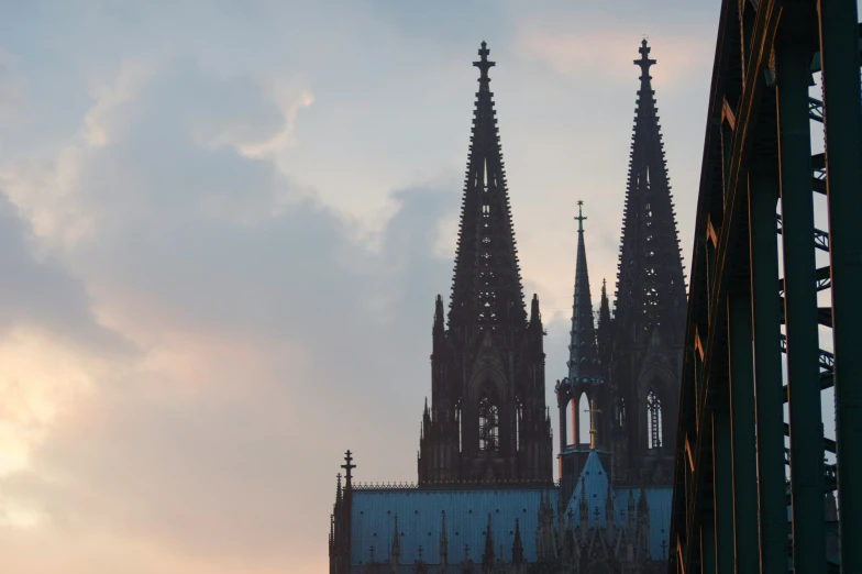 a view of the large building with two steeples