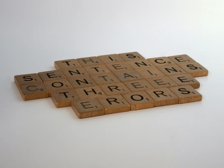 a scrabble with letters spelling things that are not words