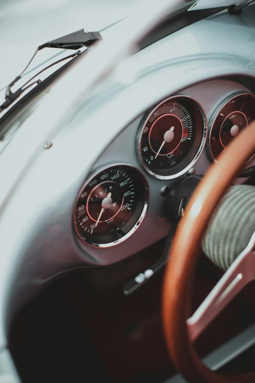 a car dashboard showing two gauges and several meters