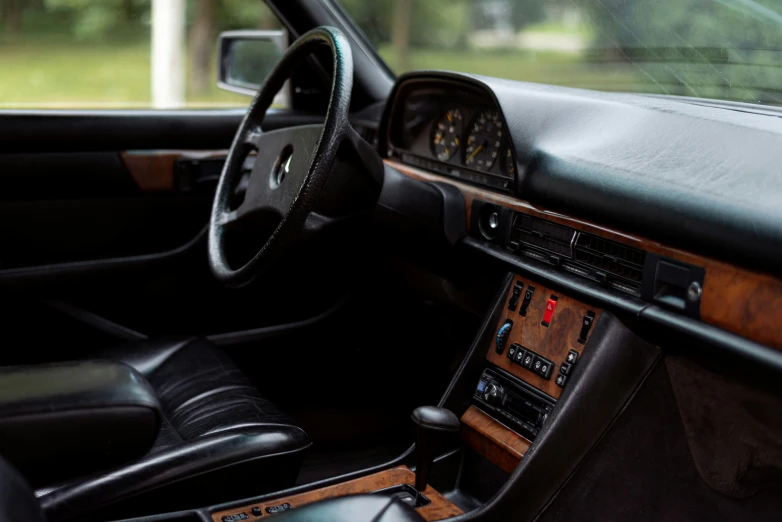 a car dashboard with various electronic controls