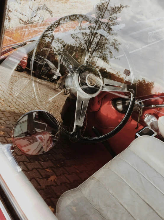 the rear view mirror of a parked car