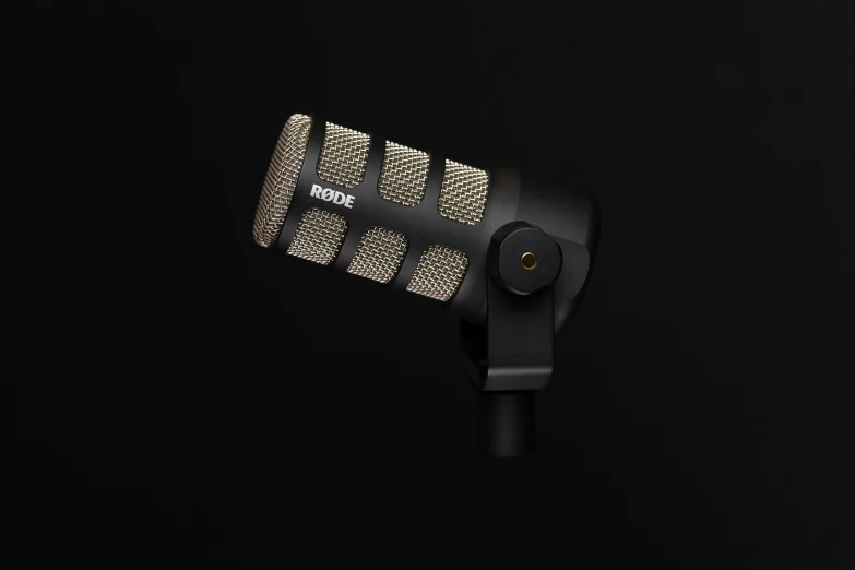 a microphone on a black background with some lights