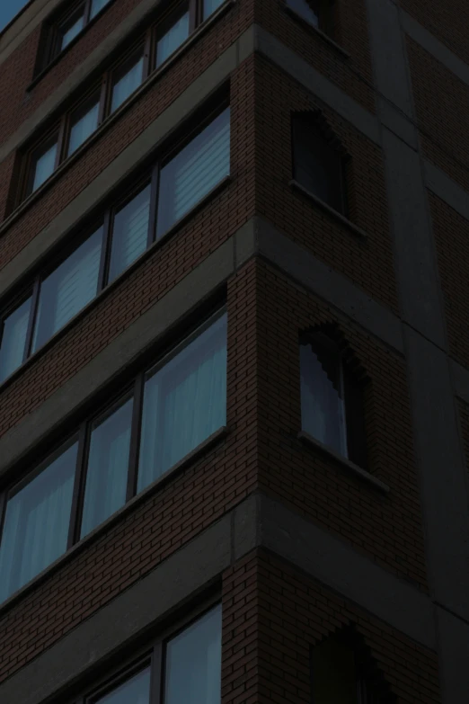 a clock on a building next to windows