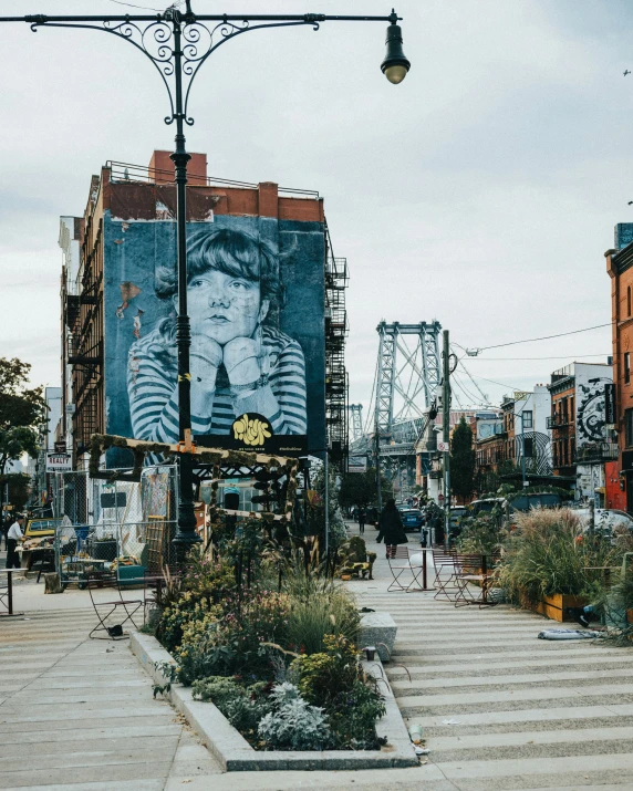 a huge billboard sits behind a fire hydrant