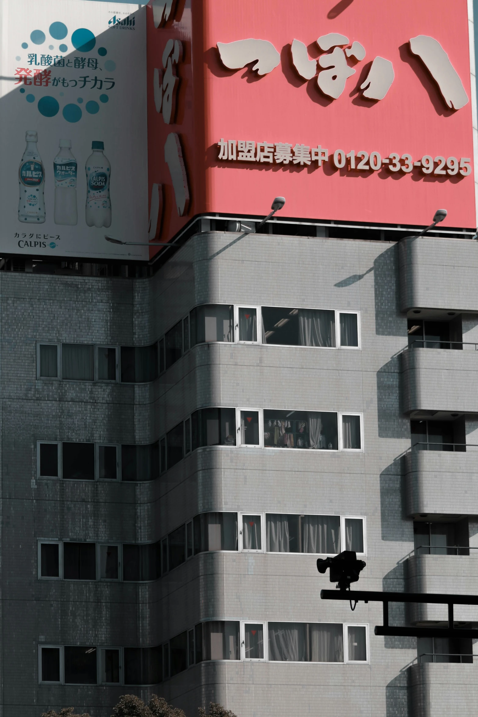 two buildings with different color in the city