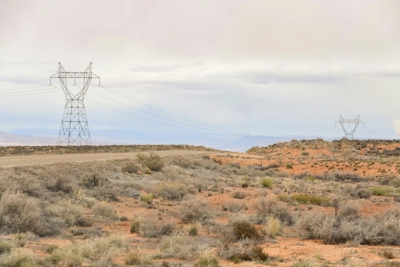 an electric tower in the middle of nowhere