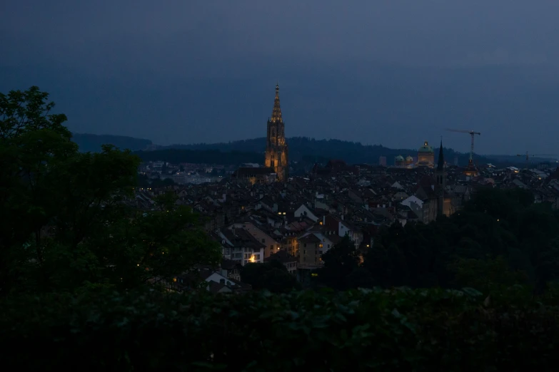 a dark city is shown, during dusk