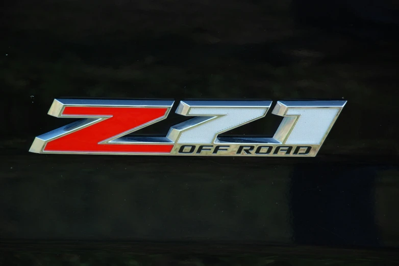 a black car has a red z 7 off road emblem