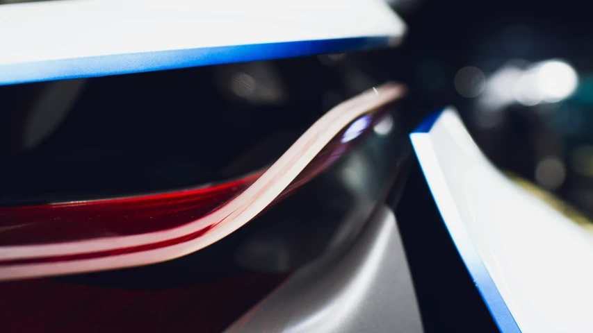 a red and blue bowl is on the floor