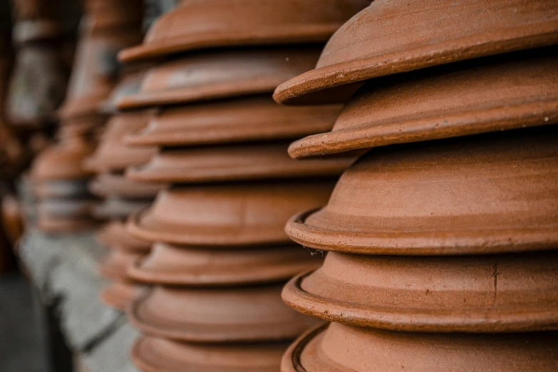 a group of clay pots sitting next to each other