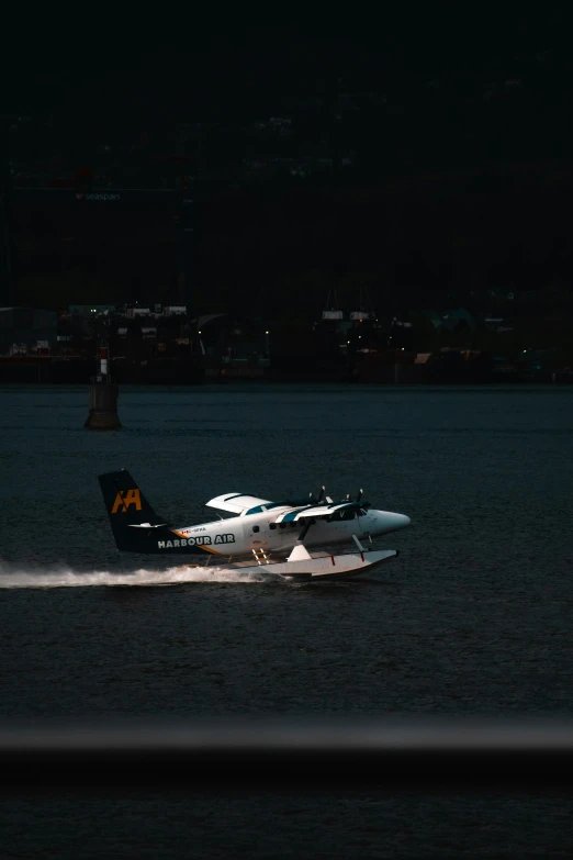 two speed boats floating on top of a lake