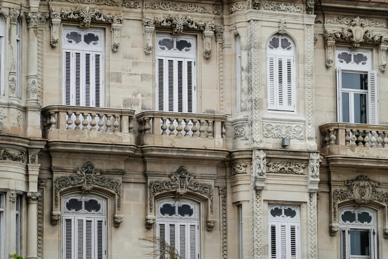the old buildings have multiple windows and decorative designs