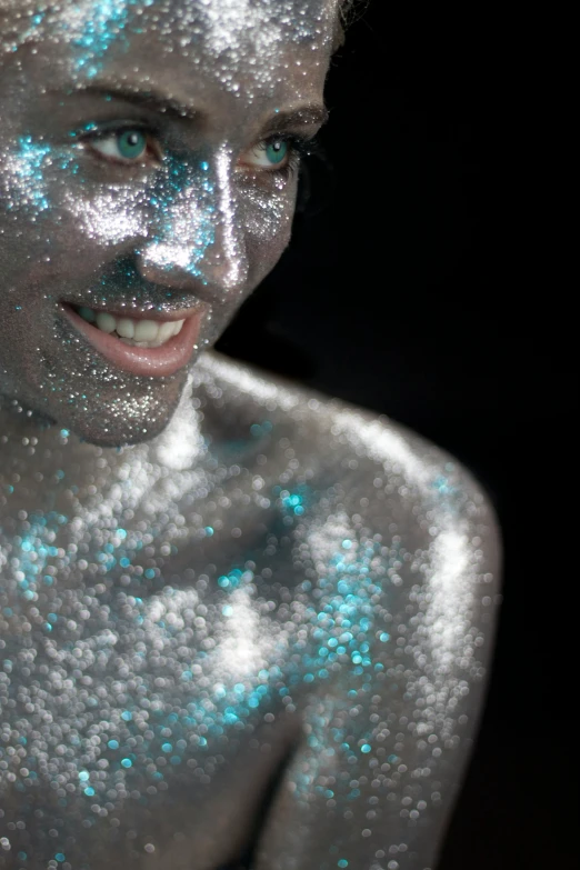 man with white powder on his face and body