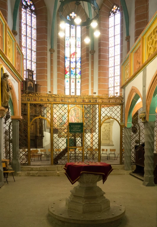 the altar is situated in the center of the church