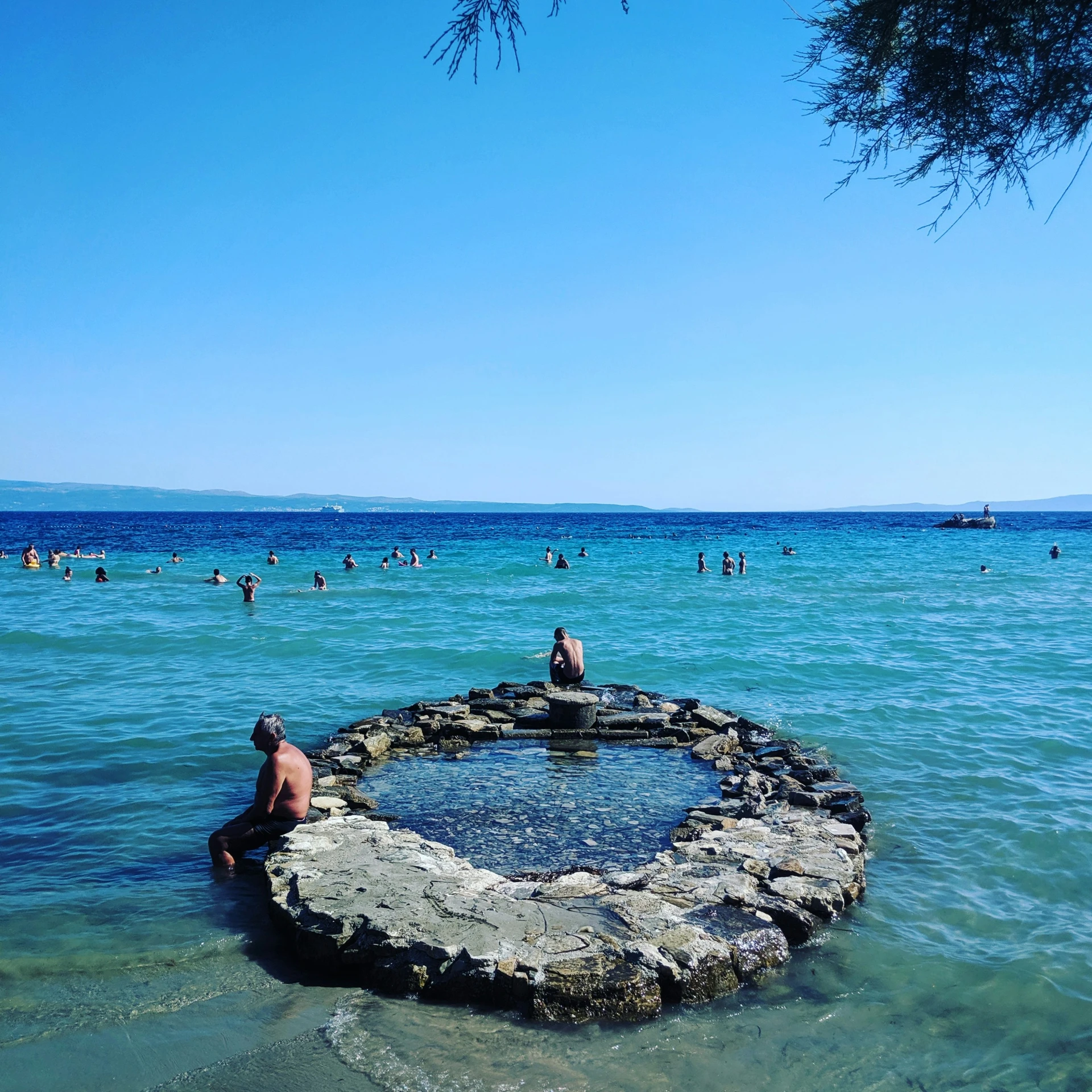 an image of people playing in the water