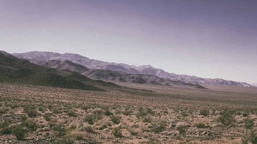 view of mountains and a desert in the background