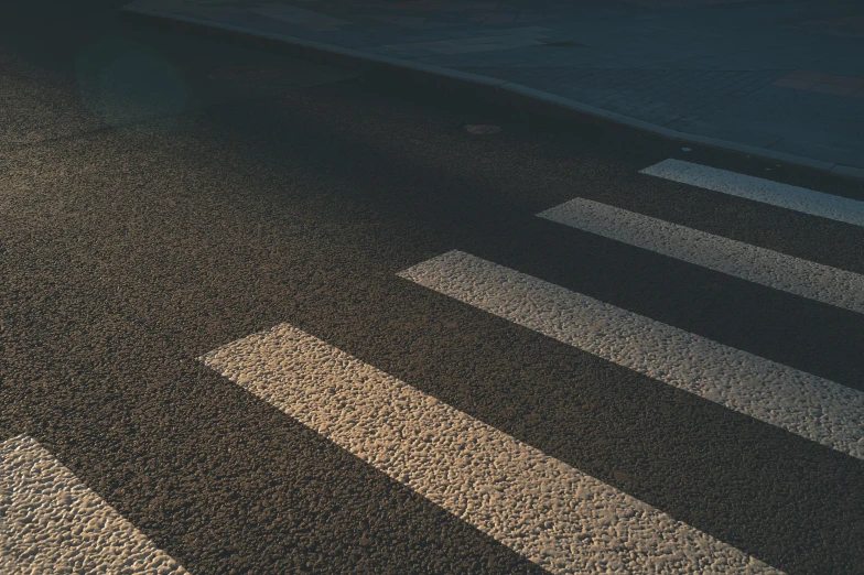 shadows of an intersection on the ground