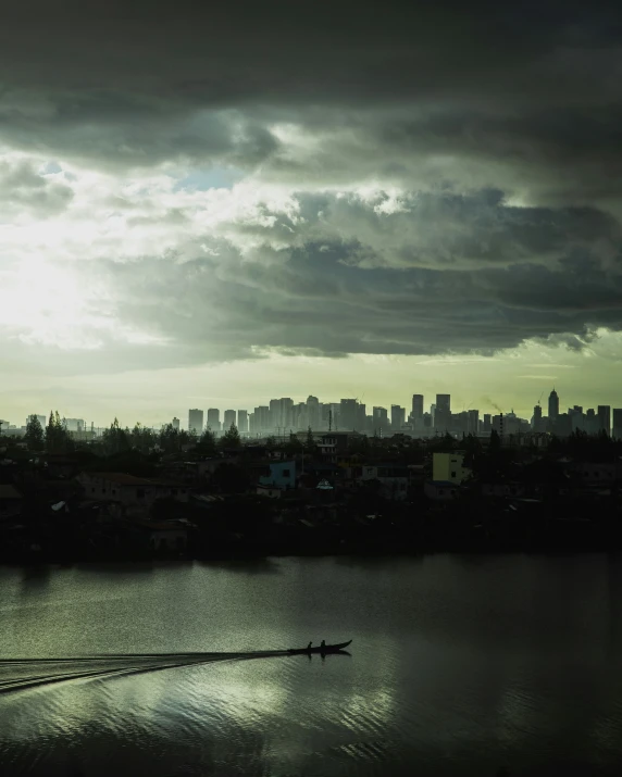 the city is in a distance that can be seen from a river