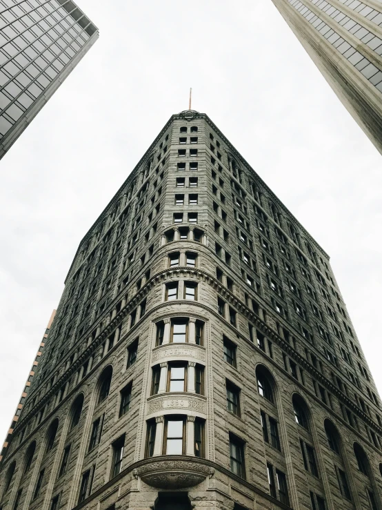 looking up at the facade of a high building