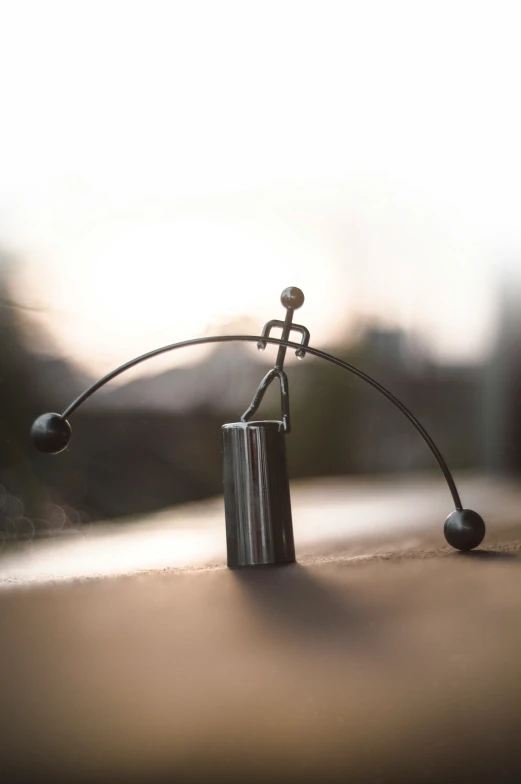 a single cylinder sitting on top of a table