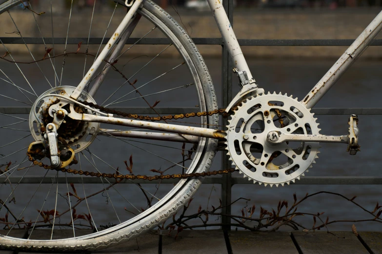 the wheel is broken and is resting on the rail