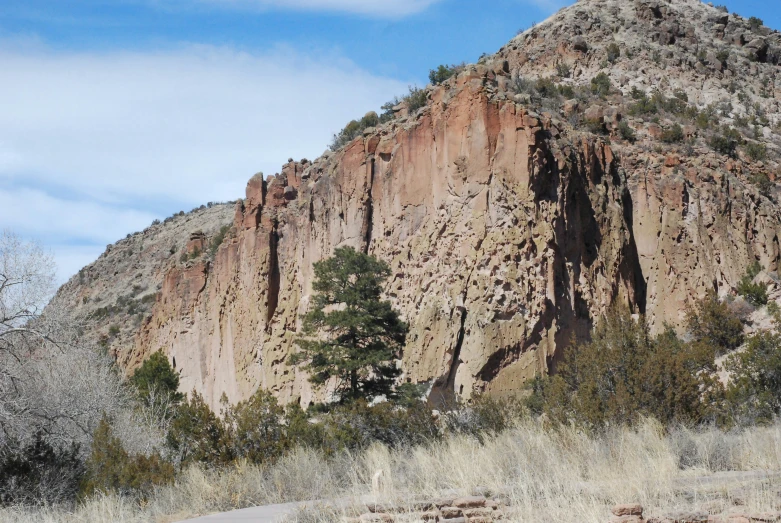 a mountain side that has many large rocks on it