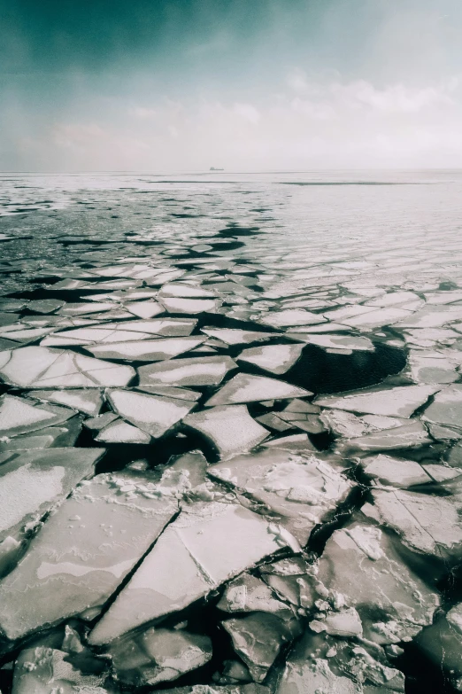 ice on a snowy surface with a sky background