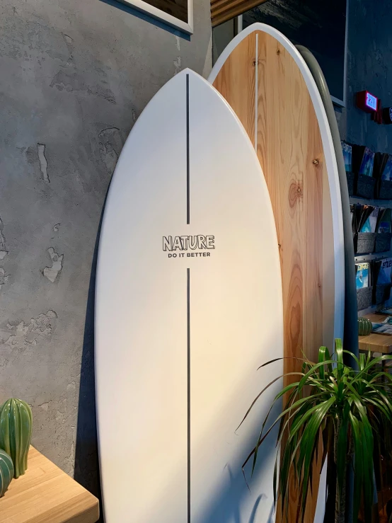 a group of surfboards standing next to each other