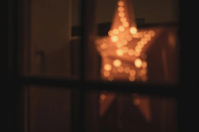 a reflection of lights on an eiffel tower