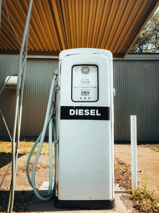 an old diesel pumps out to the roadside