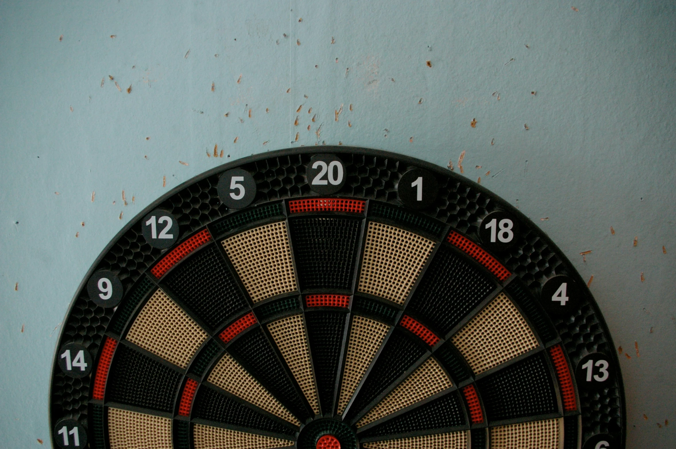 an overhead s of a dart on the wall