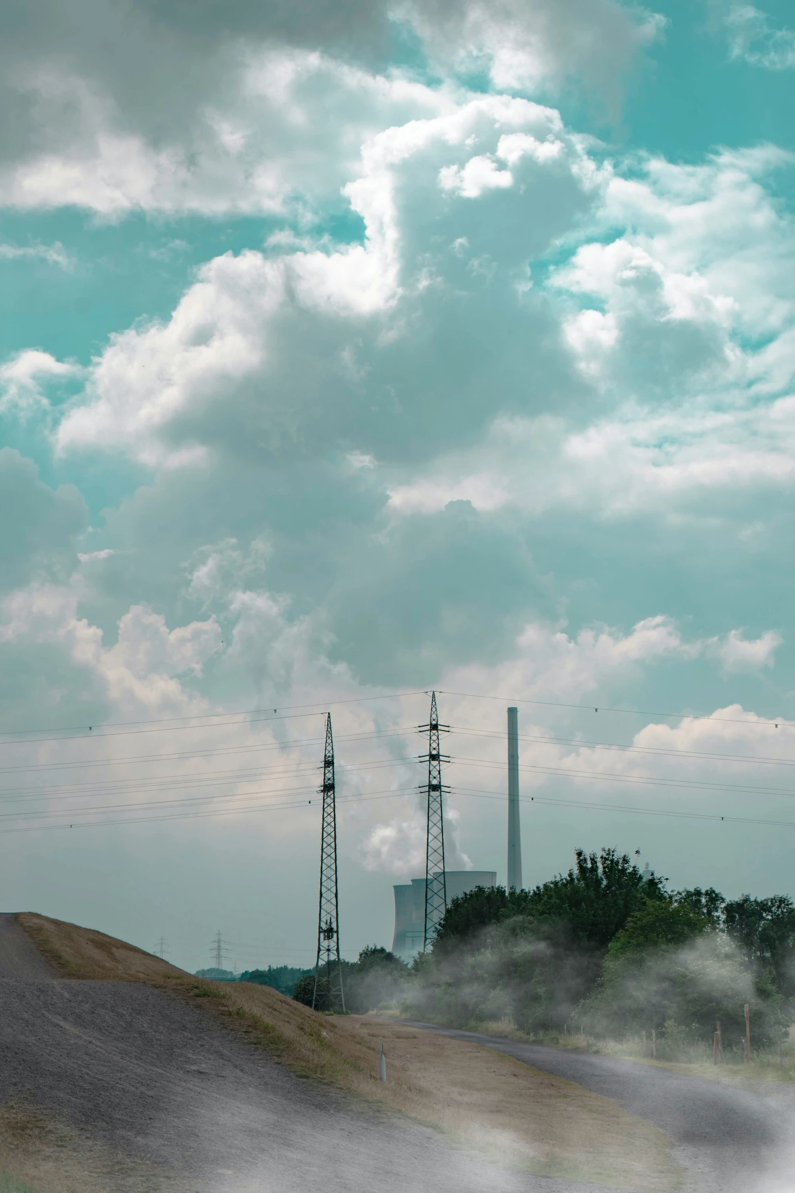  air rises above some power lines and trees