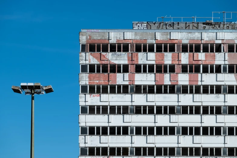 a large building with lots of windows and balconies