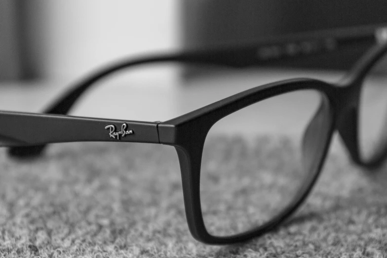 the black frame of a pair of glasses