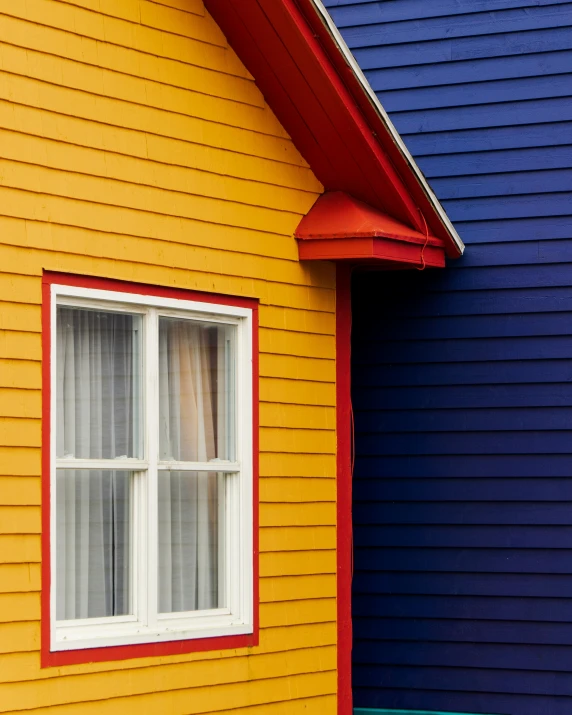 a close up of a colorful wall and a house