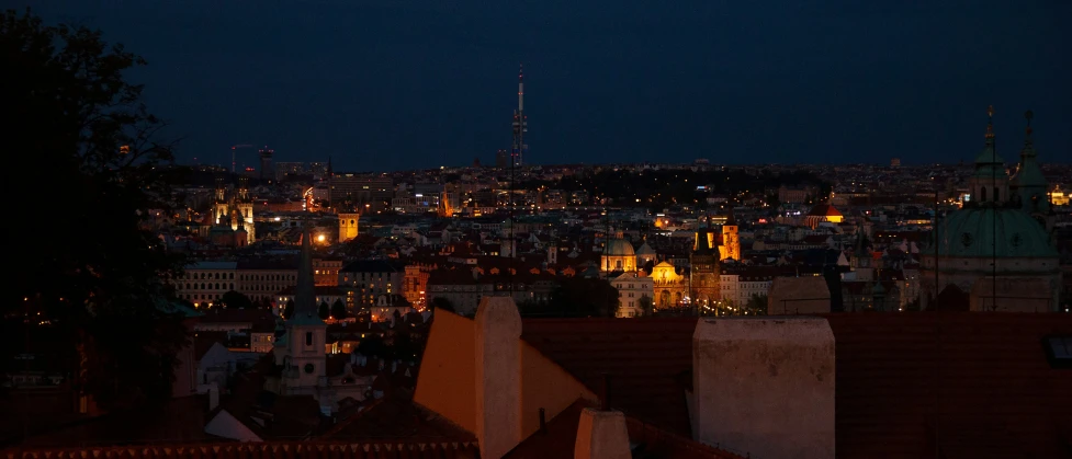 a dark cityscape with buildings lit up at night